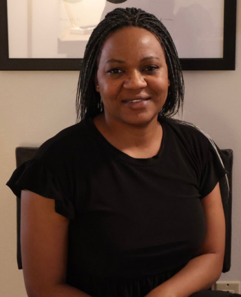 The bio image for fellow, Tracey Zhoronie Manyani.